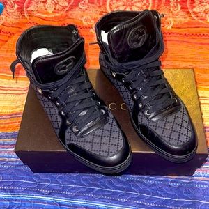 GUCCI men’s high top sneakers.